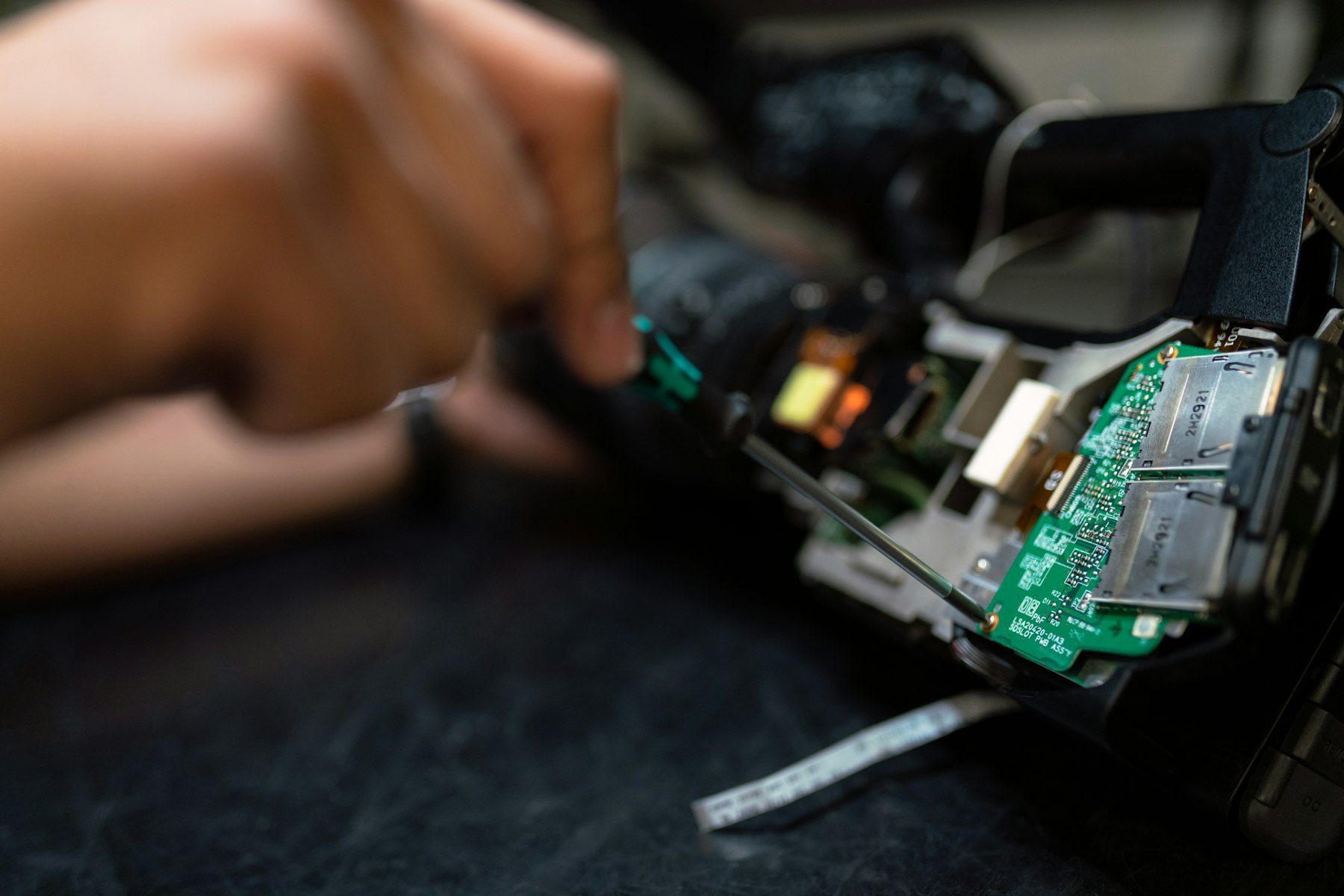 Technician working at a manufacturing station